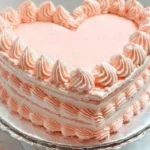 Charming heart cake decorated with simple elegance