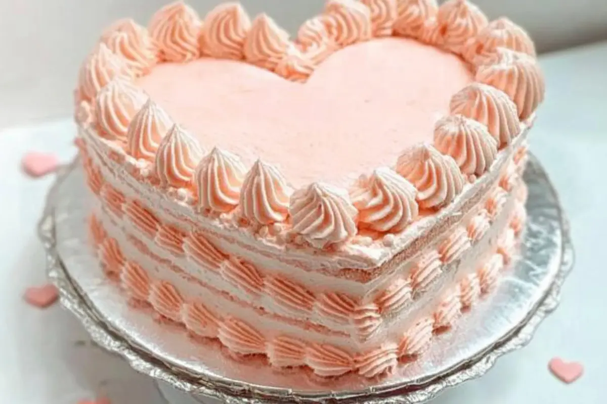 Charming heart cake decorated with simple elegance